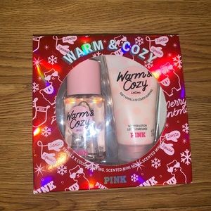 Unopened pink body spray and lotion
